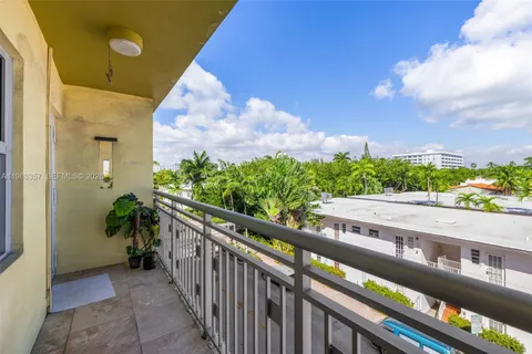 a view of a balcony with city view