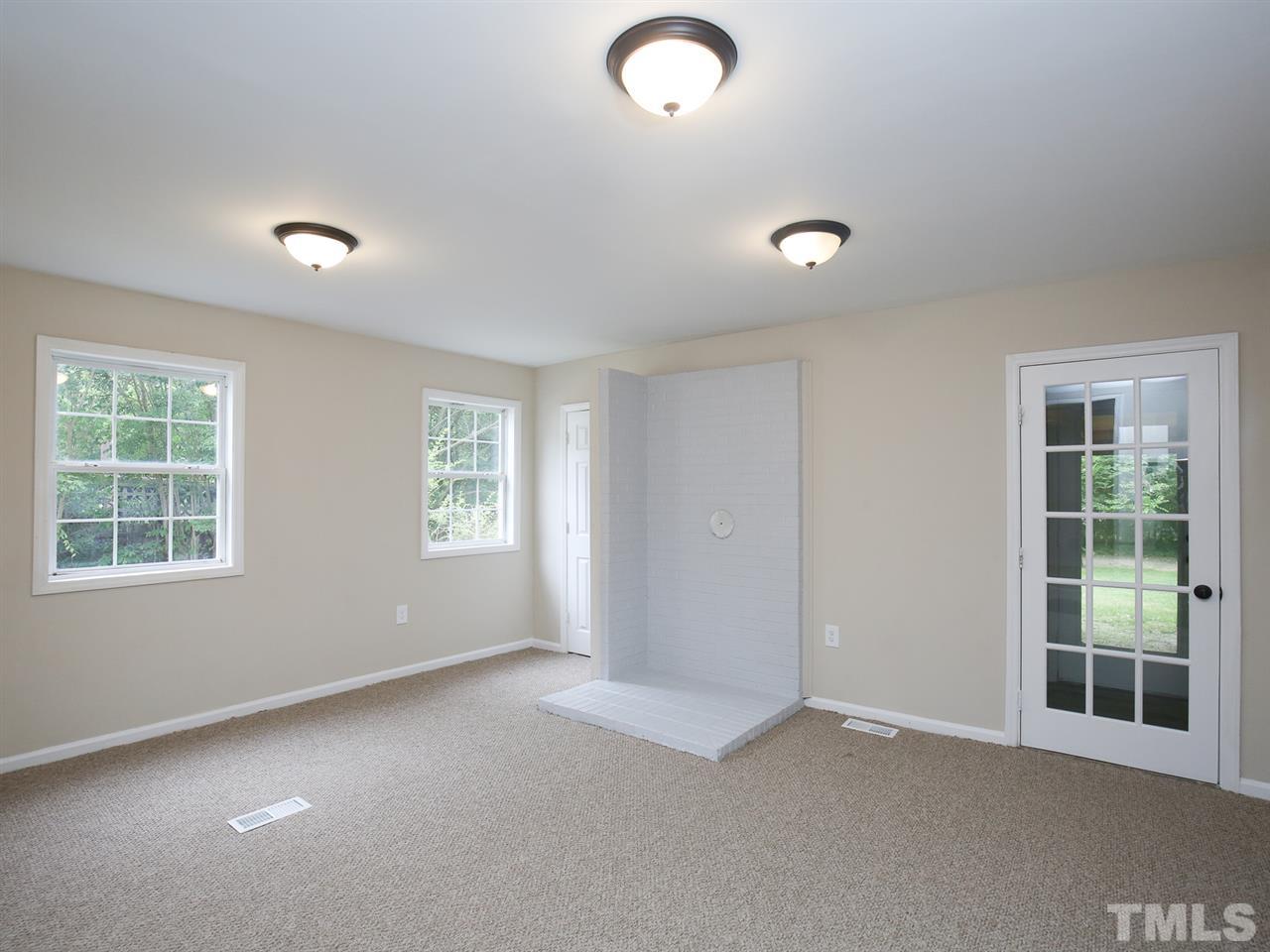 312 Colleton Road Raleigh, NC 27610 - Photo 15 of 25 an empty room with windows and closet