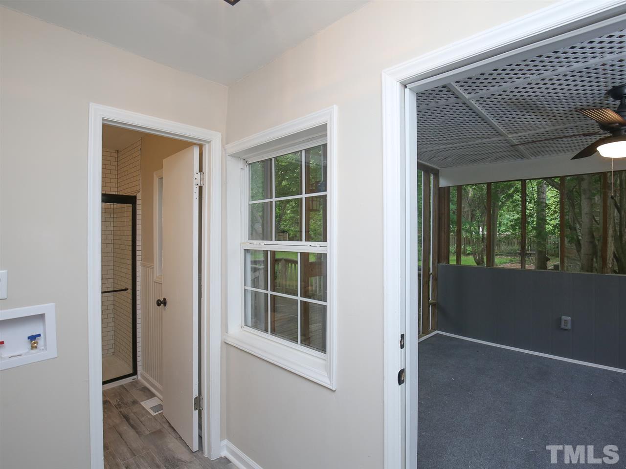 312 Colleton Road Raleigh, NC 27610 - Photo 17 of 25 a view of empty room with windows
