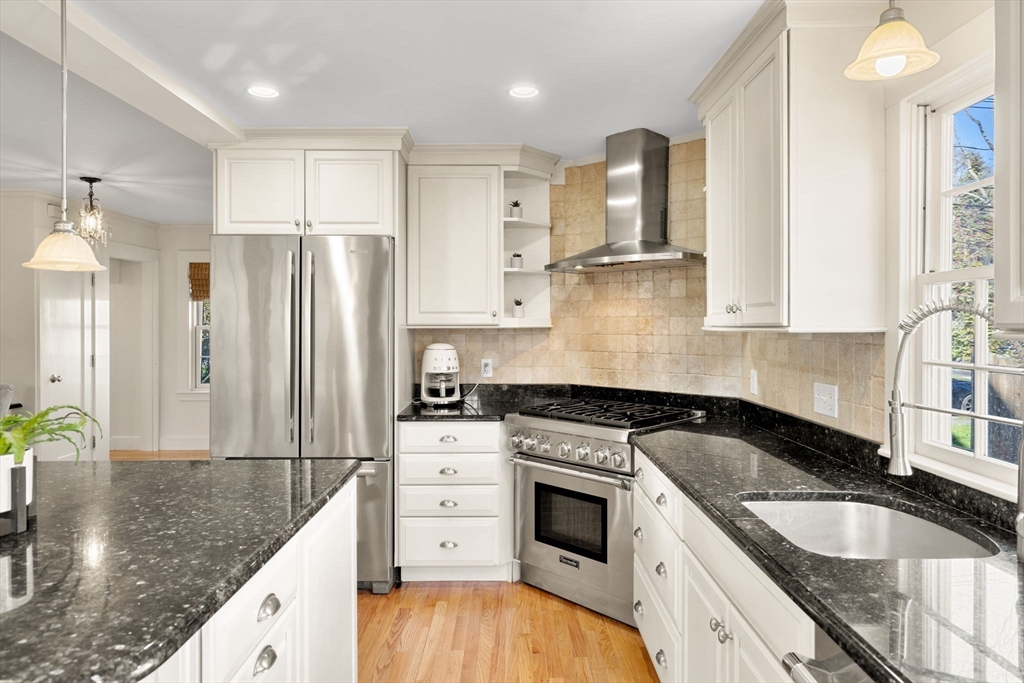 10 Pickwick Road Marblehead, MA 01945 - Photo 6 of 42 a kitchen with granite countertop a sink stainless steel appliances and cabinets