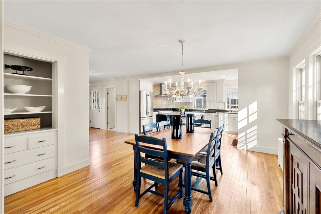 10 Pickwick Road Marblehead, MA 01945 - Photo 8 of 42 a view of a dining room with furniture window and wooden floor