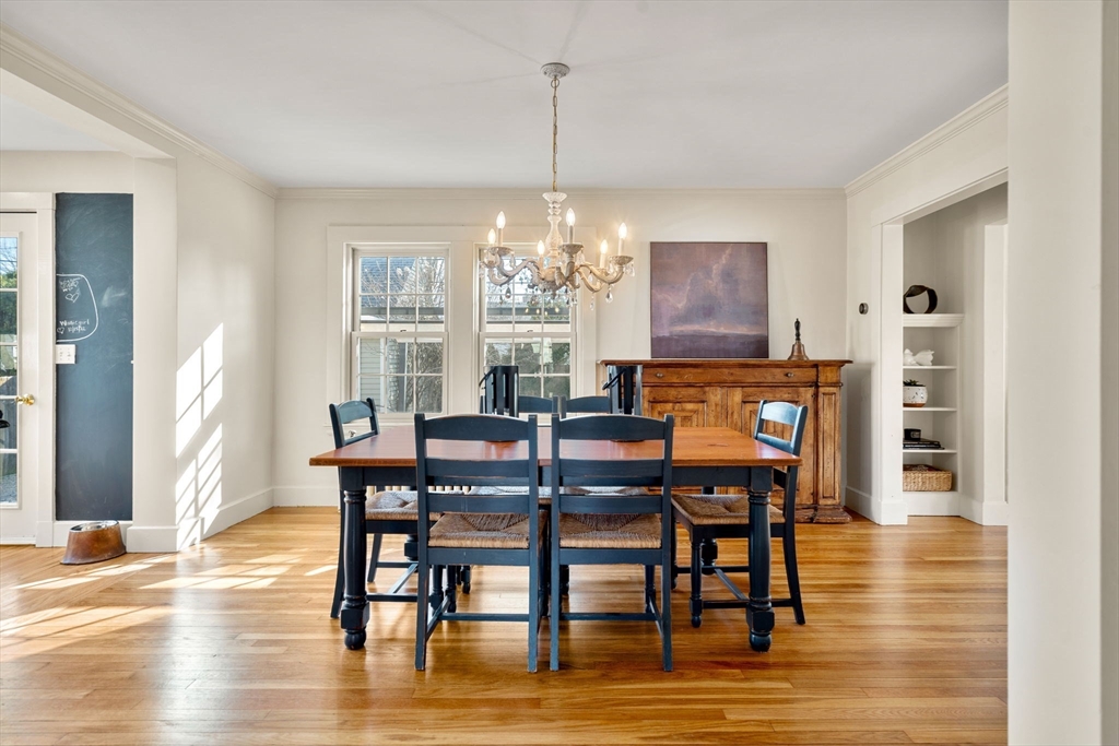 10 Pickwick Road Marblehead, MA 01945 - Photo 9 of 42 a view of a dining room with furniture window and wooden floor