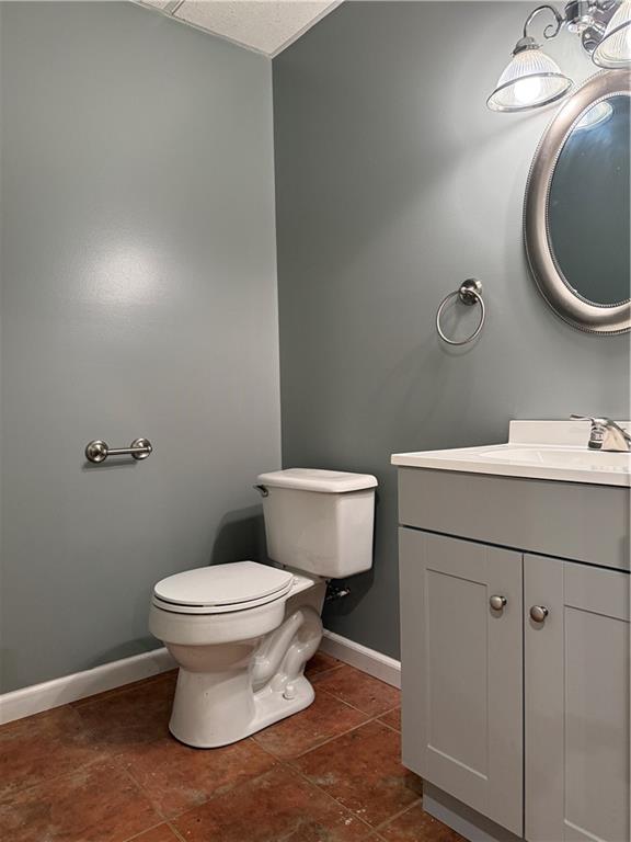 293 Sandy Hill Road Valencia, PA 16059 - Photo 49 of 50 a bathroom with a toilet sink and mirror