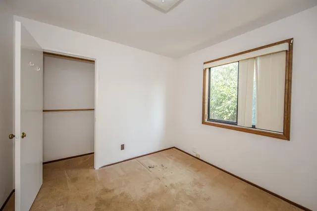 an empty room with windows