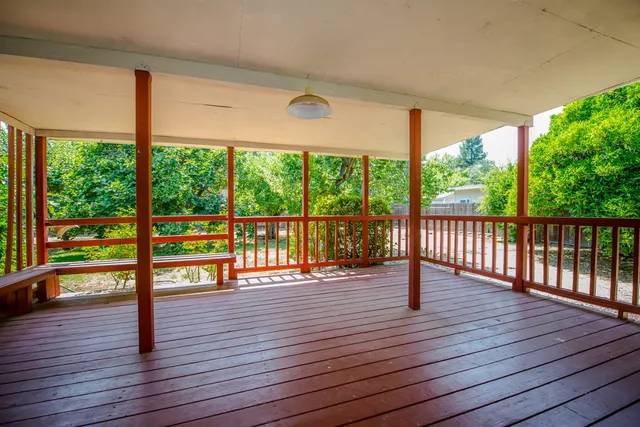 a view of steet with balcony