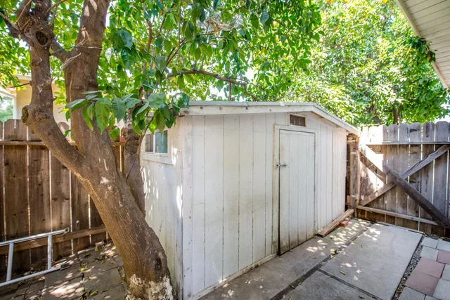 a house view with a backyard space