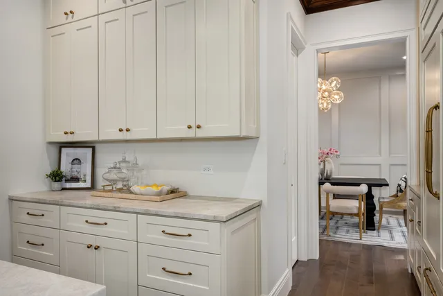 a room with furniture and a mirror