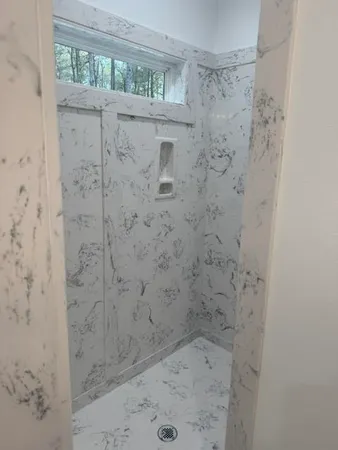 a view of a bathtub in bathroom