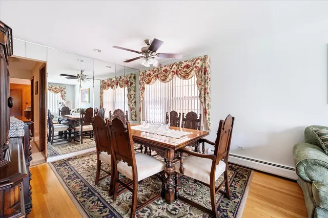 a view of a livingroom with furniture and a window