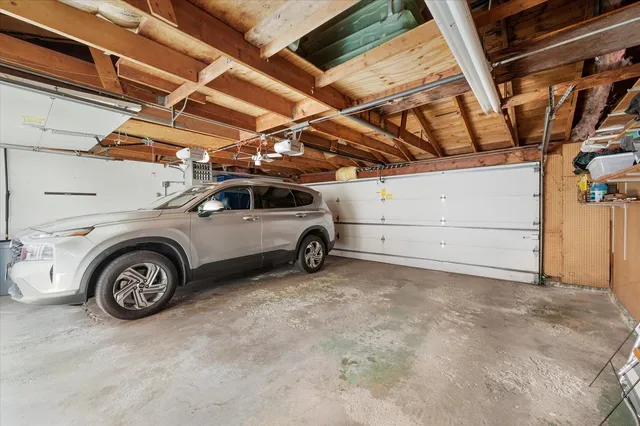 a picture of a bench in front of a building