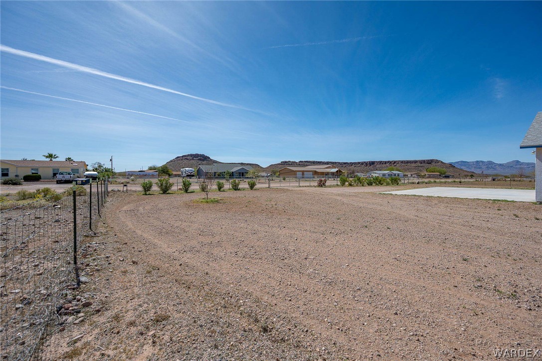 3411 West Carmichael Road Golden Valley, AZ 86413 - Photo 69 of 97 View of yard featuring a mountain view