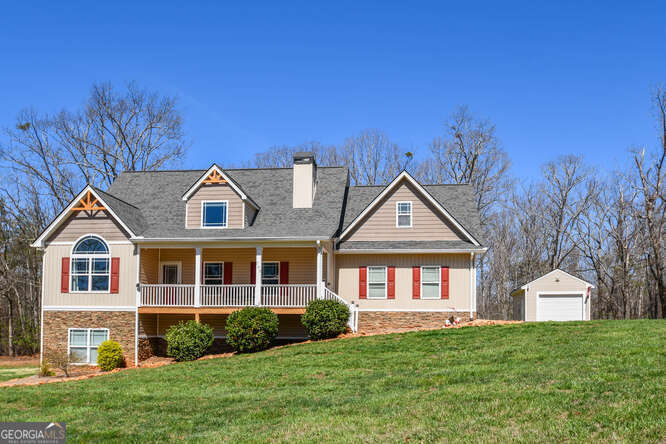 290 Eli Knob Road Dahlonega, GA 30533 - Photo 2 of 87 a front view of a house with a yard