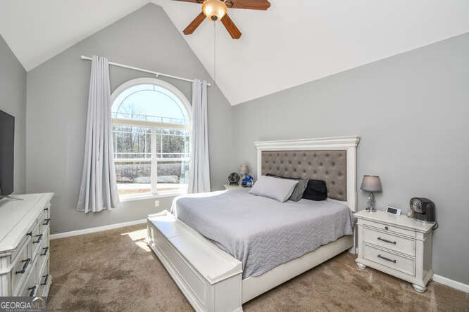 290 Eli Knob Road Dahlonega, GA 30533 - Photo 23 of 87 a bedroom with a bed and a window