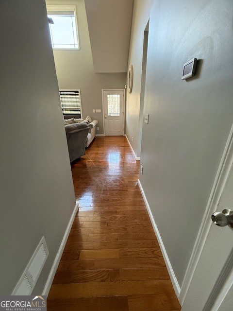 290 Eli Knob Road Dahlonega, GA 30533 - Photo 32 of 87 a view of a hallway view with floor to ceiling window and stairs