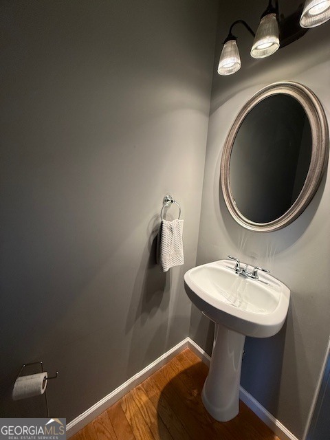 290 Eli Knob Road Dahlonega, GA 30533 - Photo 34 of 87 a bathroom with a sink toilet and mirror