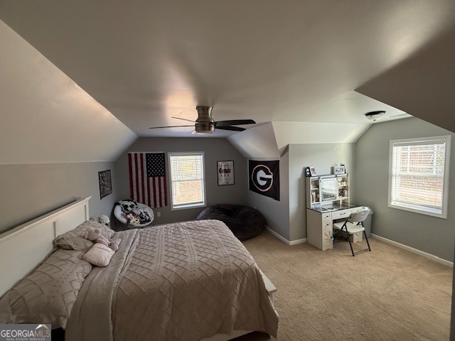 290 Eli Knob Road Dahlonega, GA 30533 - Photo 42 of 87 a bedroom with a bed and wooden floor