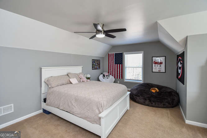 290 Eli Knob Road Dahlonega, GA 30533 - Photo 43 of 87 a bedroom with a bed and window