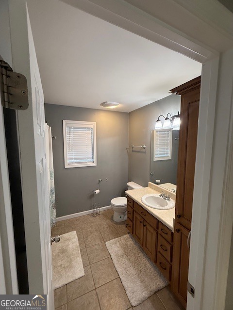 290 Eli Knob Road Dahlonega, GA 30533 - Photo 56 of 87 a bathroom with a sink a toilet and mirror
