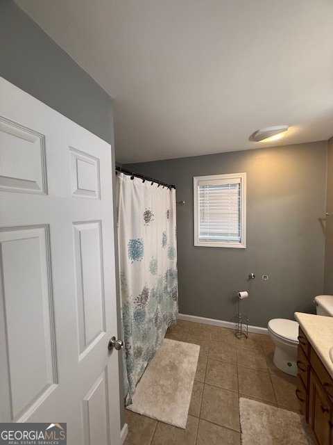 290 Eli Knob Road Dahlonega, GA 30533 - Photo 58 of 87 a bathroom with a granite countertop shower and a toilet