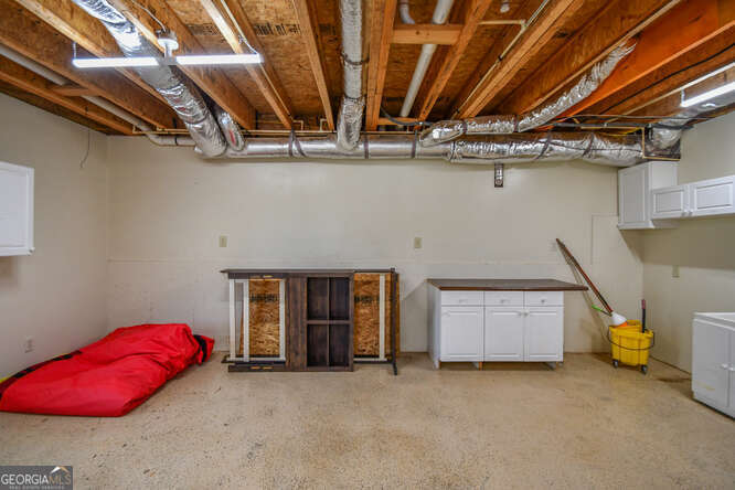 290 Eli Knob Road Dahlonega, GA 30533 - Photo 71 of 87 a view of a room with gym equipment