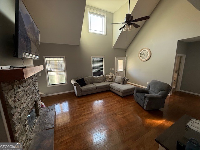 290 Eli Knob Road Dahlonega, GA 30533 - Photo 9 of 87 a living room with furniture wooden floor and a flat screen tv