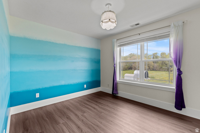 75 East 200 North Mendon, UT 84325 - Photo 17 of 36 Spare room with dark wood finished floors and baseboards