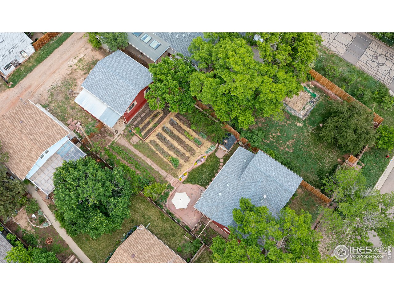 208 Main Street Lyons, CO 80540 - Photo 3 of 27 Beautiful backyard with gardens and patio