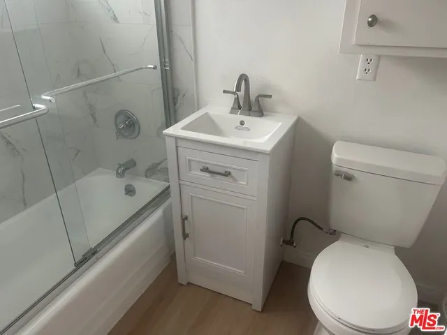 a view of a street with cars