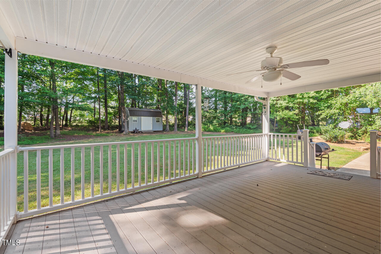 2023 Antioch Church Road Timberlake, NC 27583 - Photo 27 of 40 a view of a balcony with wooden floor