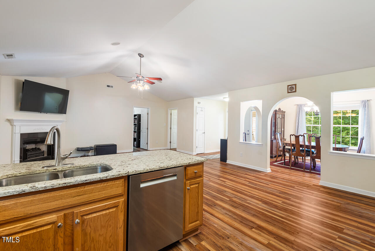 2023 Antioch Church Road Timberlake, NC 27583 - Photo 10 of 40 a view of living room with granite countertop furniture and fireplace