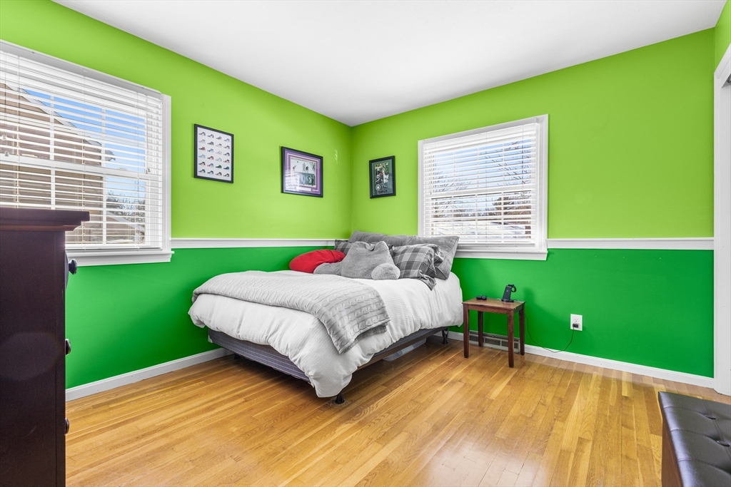 27 Audubon Road Reading, MA 01867 - Photo 19 of 35 a bedroom with a bed and a window