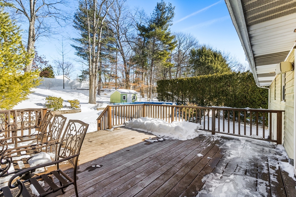 27 Audubon Road Reading, MA 01867 - Photo 32 of 35 a view of a balcony with wooden floor