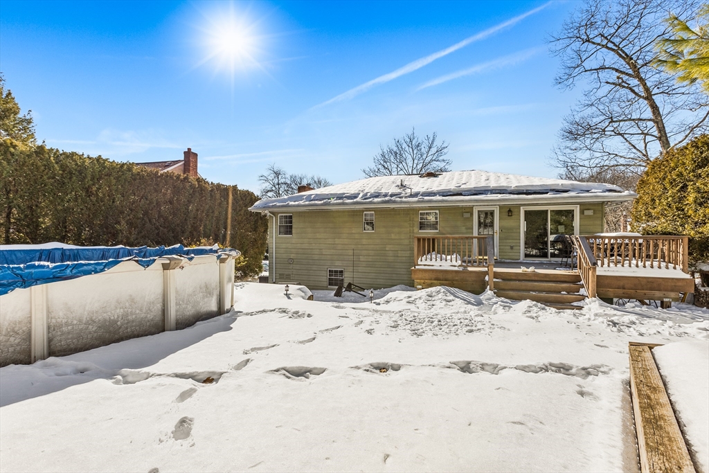 27 Audubon Road Reading, MA 01867 - Photo 33 of 35 a view of a house with snow on the road