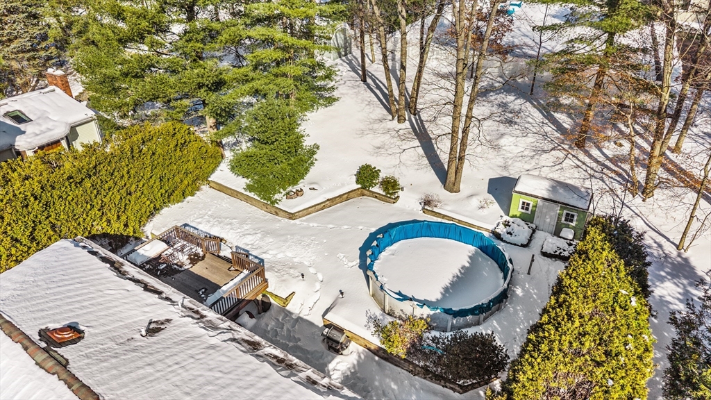 27 Audubon Road Reading, MA 01867 - Photo 4 of 35 an aerial view of a house with swimming pool and garden