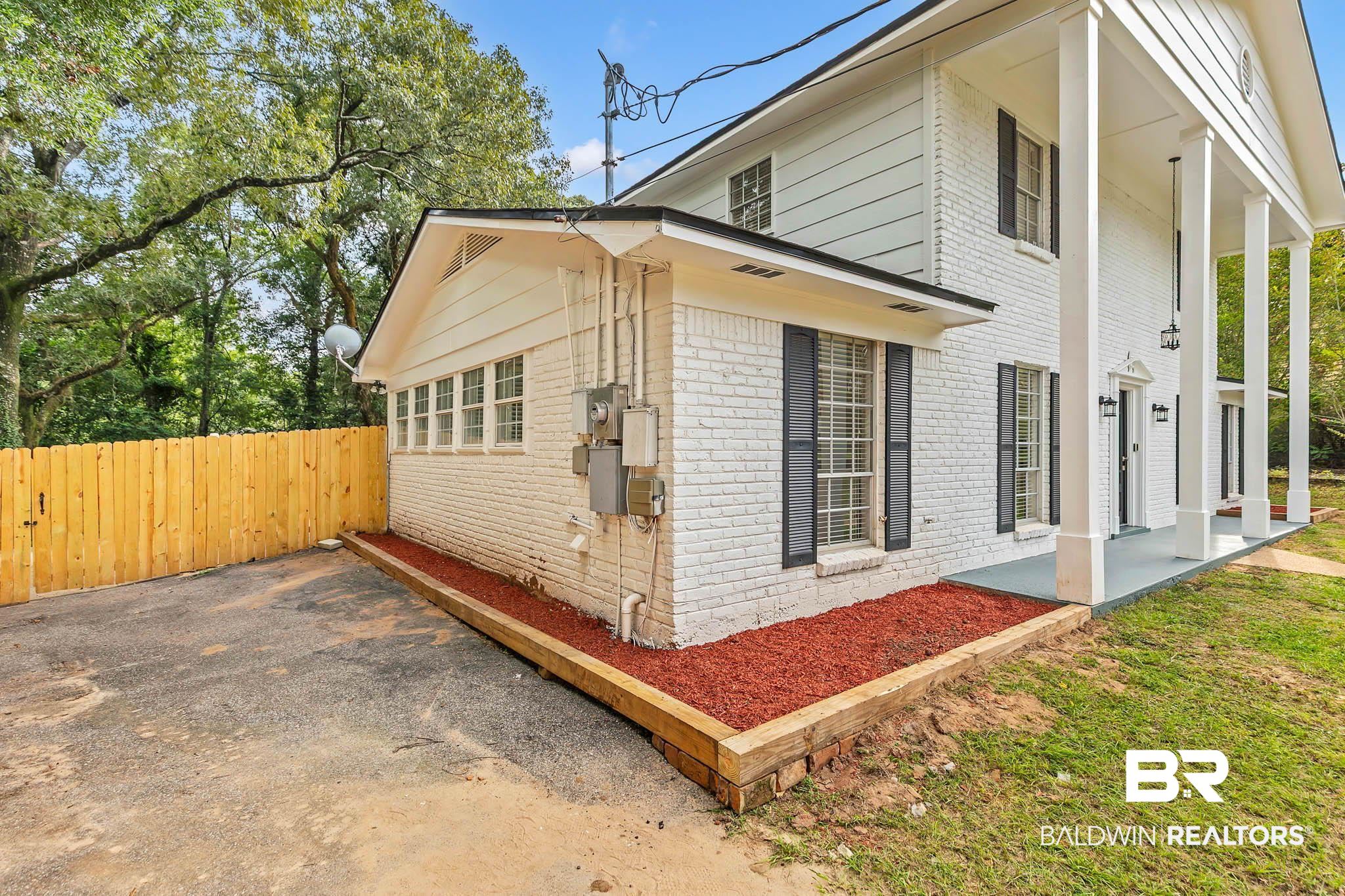 4705 Sherry Court Mobile, AL 36693 - Photo 6 of 100 View of side of home with brick siding