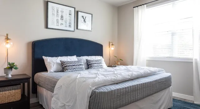 a kitchen with stainless steel appliances granite countertop a refrigerator a stove a sink and a granite counter tops