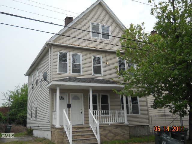 a front view of a house with a porch