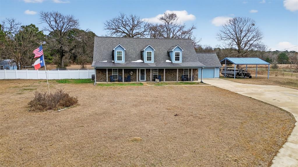 720 Haggerty Road Karnack, TX 75661 - Photo 38 of 39 a front view of a house with a yard