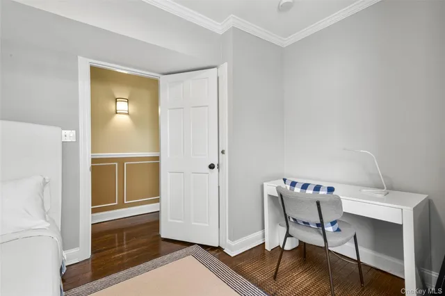 a view of dining room with furniture and wooden floor
