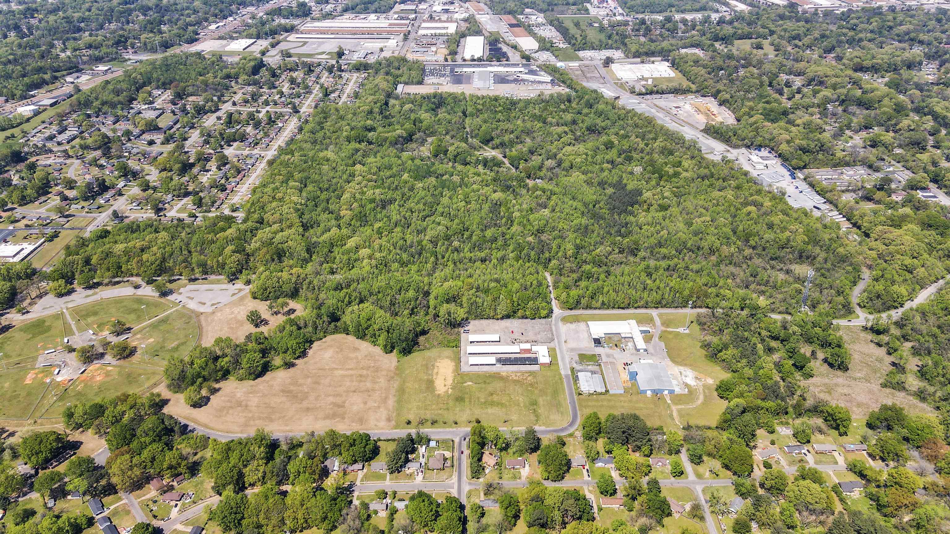 3880 East Levi Road Memphis, TN 38109 - Photo 6 of 7 an aerial view of residential houses with yard