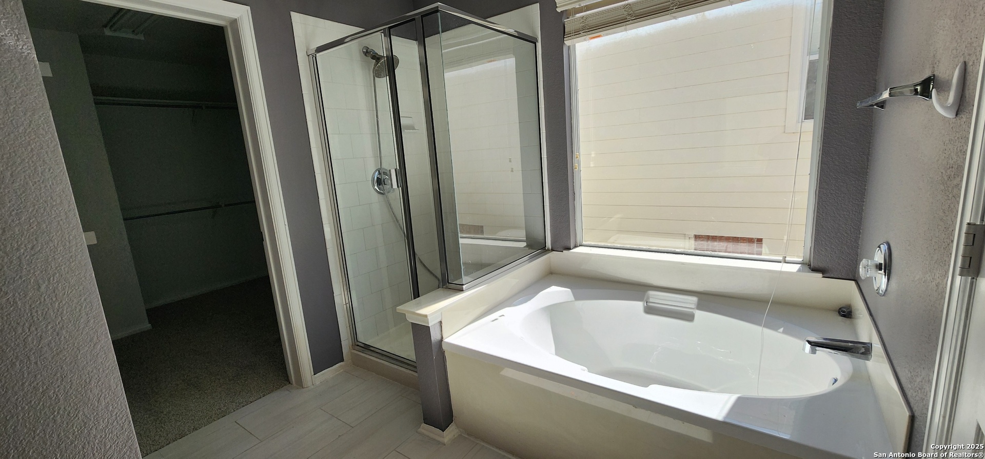 15710 Robin View San Antonio, TX 78255 - Photo 21 of 26 a white bath tub sitting next to a sink