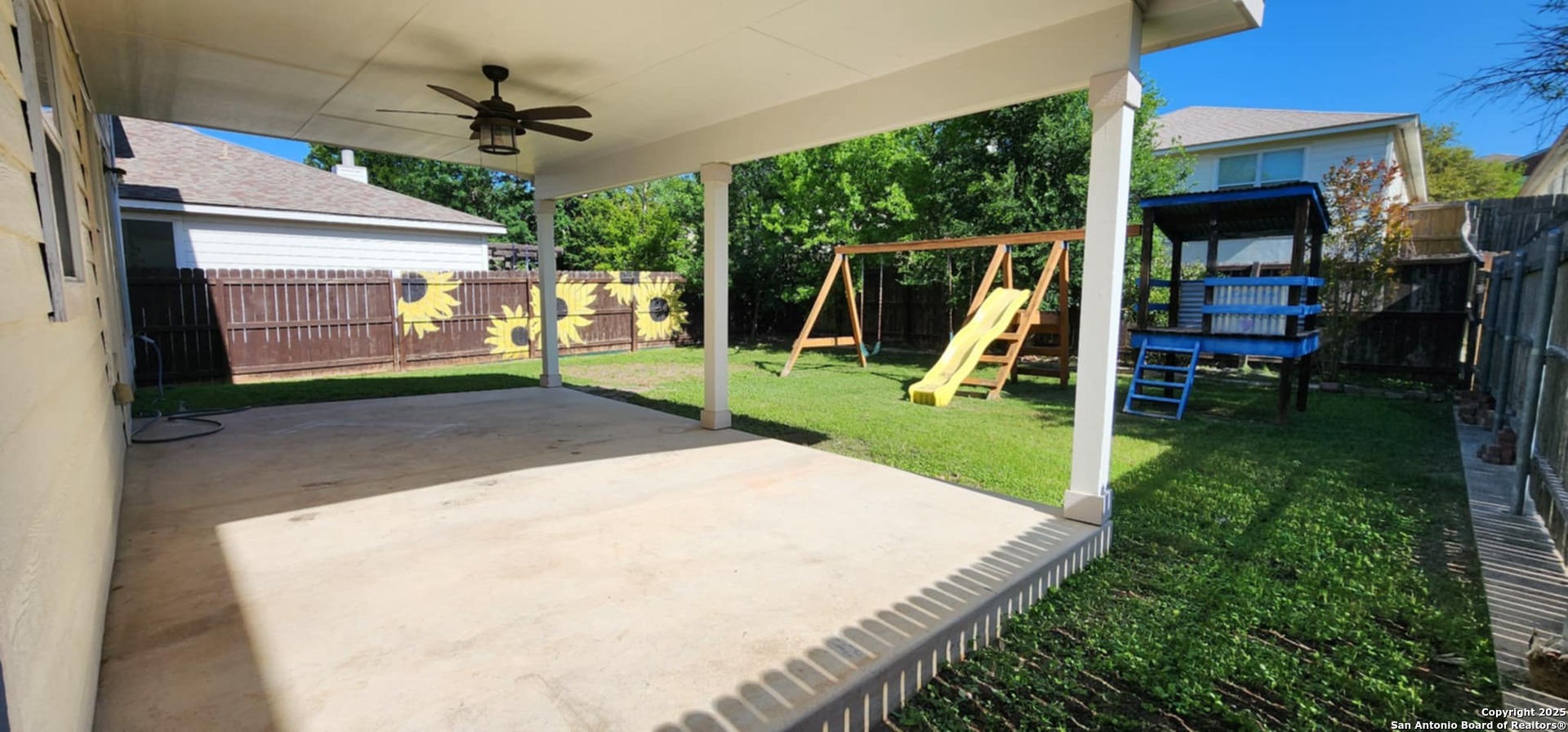 15710 Robin View San Antonio, TX 78255 - Photo 26 of 26 a view of a backyard with a patio