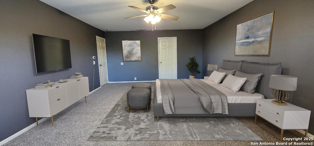 15710 Robin View San Antonio, TX 78255 - Photo 8 of 26 a bedroom with a bed and a flat screen tv