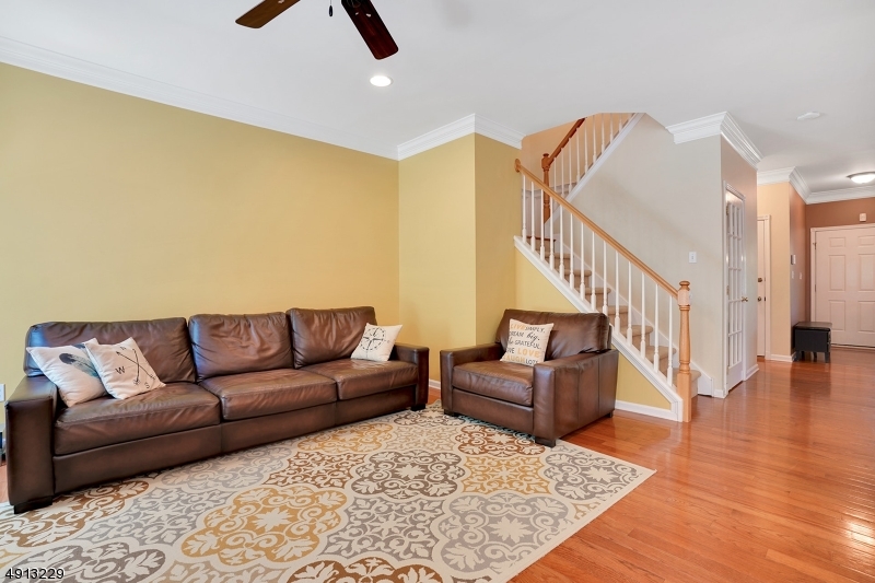 8 Hancock Court Bernards, NJ 07920 - Photo 12 of 25 a living room with furniture and a rug