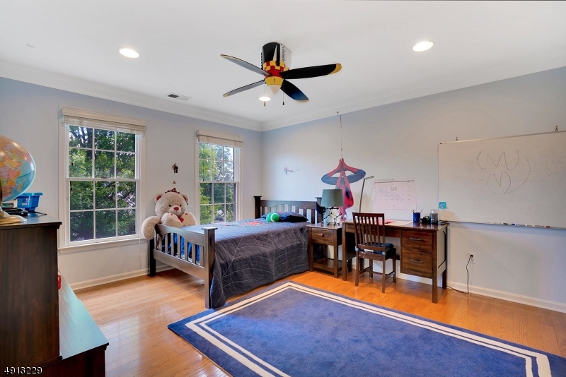 8 Hancock Court Bernards, NJ 07920 - Photo 19 of 25 a bedroom with furniture and a window