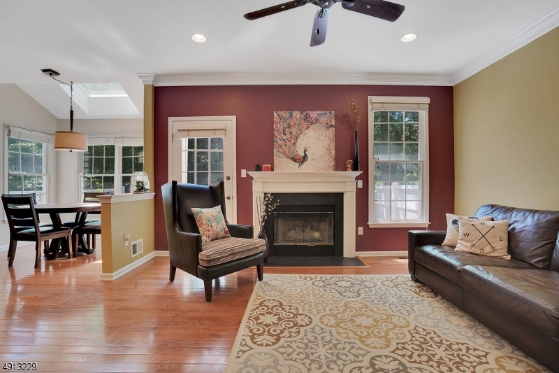 8 Hancock Court Bernards, NJ 07920 - Photo 10 of 25 a living room with furniture and a fireplace