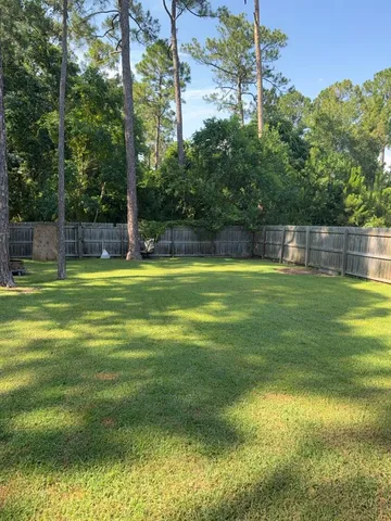 a swimming pool that is in the garden