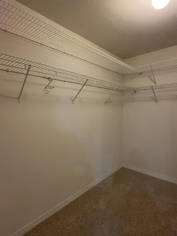 a view of a room with racks on the wall
