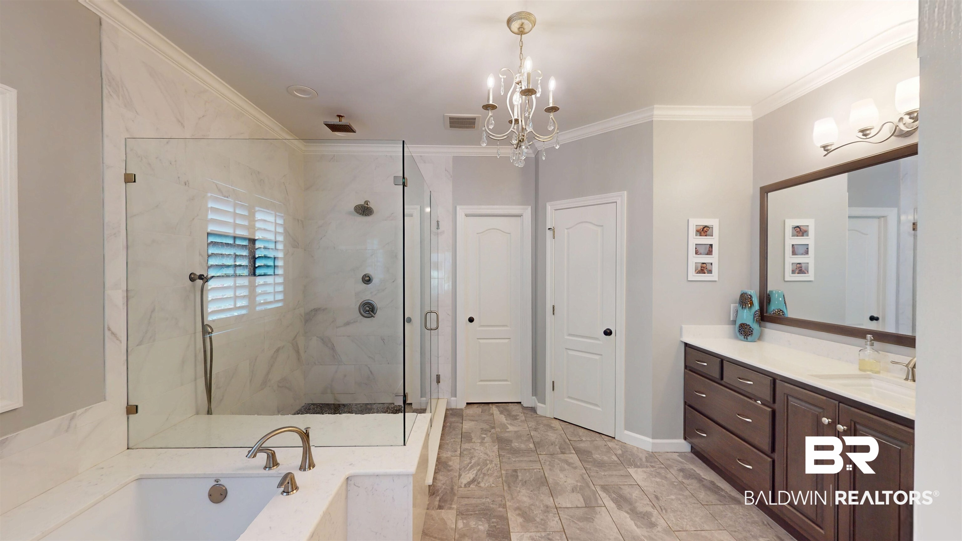 8775 Dawes Lake Road North Mobile, AL 36619 - Photo 29 of 59 Full bathroom with a stall shower, a chandelier, a garden tub, vanity, and crown molding