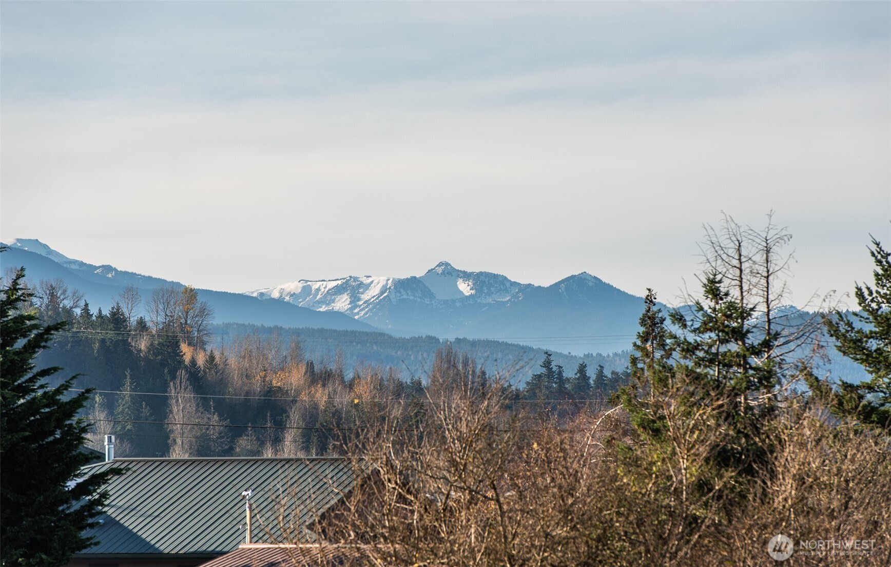 0 Washington Harbor Road Sequim, WA 98382 - Photo 2 of 13 a view of a house with a yard and a forest